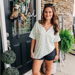 Sage green daisy top